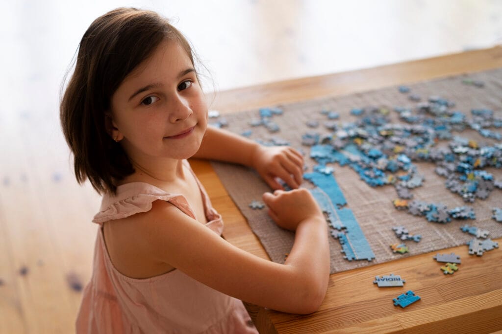 A Girl playing with puzzles to sharpen her memory at The Best Memory Techniques Classes in Basavanagudi, Bangalore
